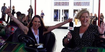 two ladies laughing in a dodgem