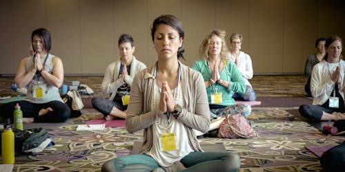 People meditating