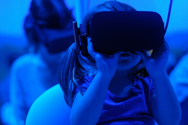 A child wearing a VR headset