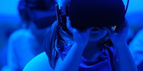 A child wearing a VR headset