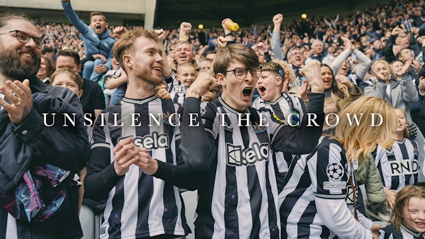 Fans at Newcastle United jumping up and down 