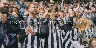 Fans at Newcastle United jumping up and down 