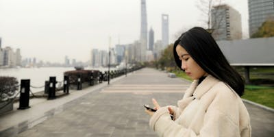 A Chinese woman on a mobile phone in China