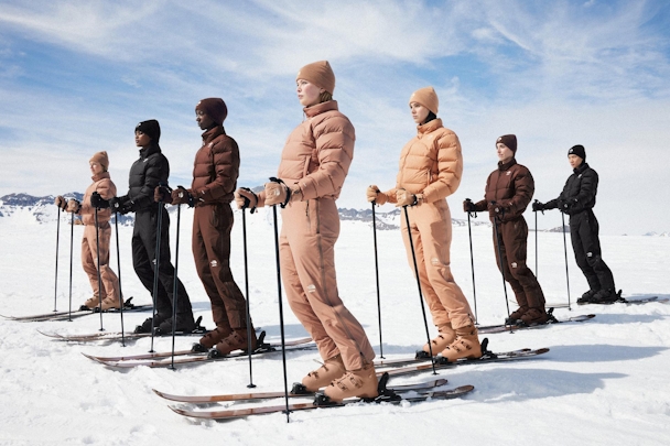 people in skin tone color ski wear