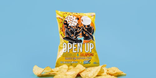 A packet of the Beavertown open up crisps with a handful of crisps placed in front