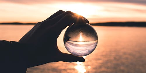 hand holding crystal ball