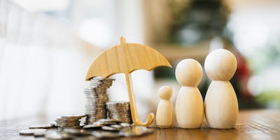 Small wooden umbrella covering 20p's 