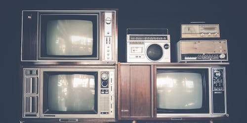 Photograph of old television sets and radios