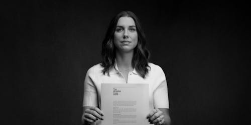 person holding a document