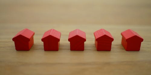 A row of small red model houses