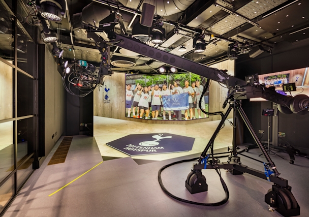 XR studio with a camera and the backdrop of the Tottenham team 