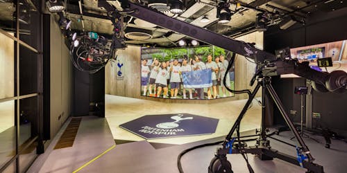 XR studio with a camera and the backdrop of the Tottenham team 